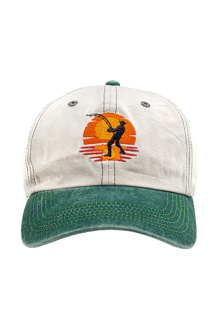 Front view of base baseball cap. Green color visor with grayish cap. With an embroidered design of a fishermen in front of sunset