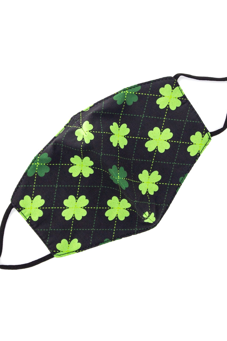 Green face mask with clovers connected with dashed lines