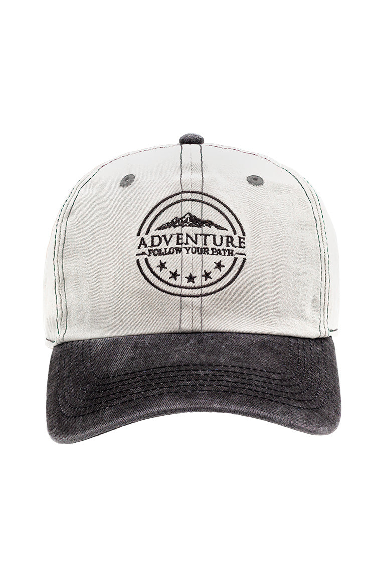Front view of base baseball cap. Black color visor with grayish cap. With an embroidered design of a mountain with the phrase underneath"Adventure follow your own path"