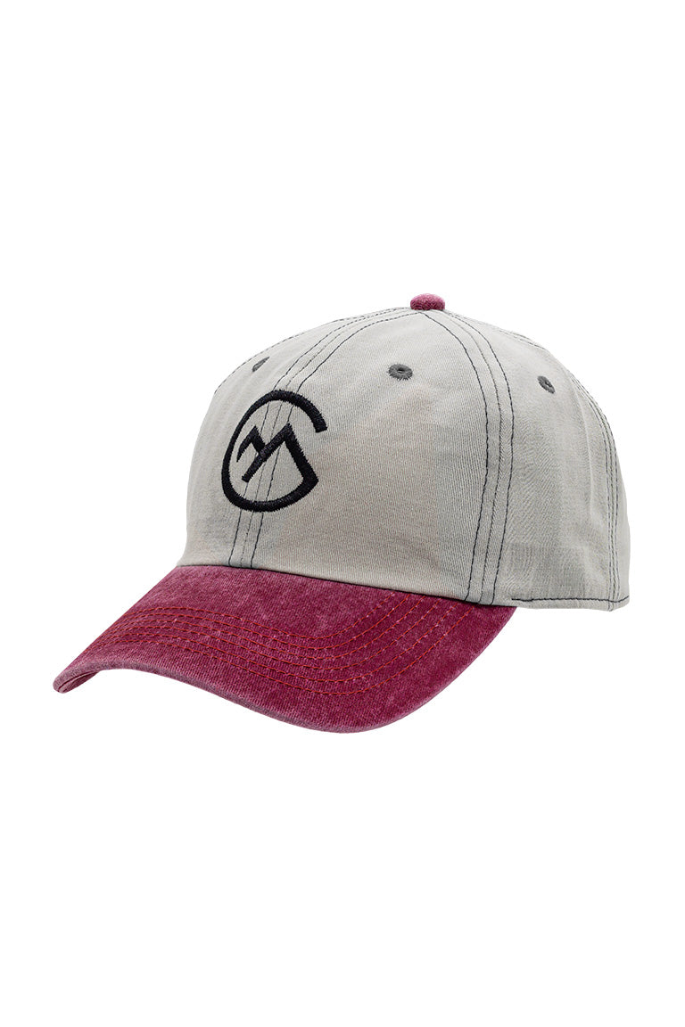 Side view of base baseball cap. Red color visor with grayish cap. With an embroidered design of a chillmeister logo