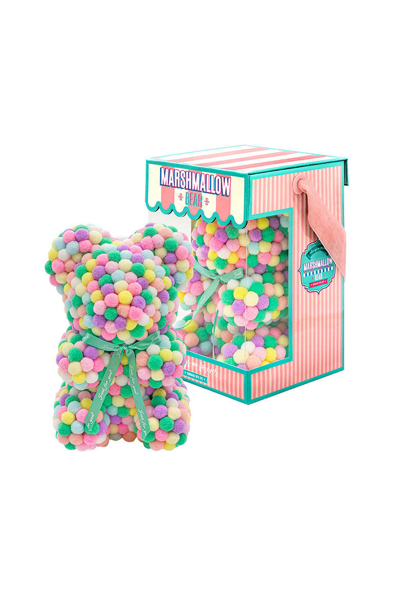 Various color of vibrant colors. Bear shape ornament covered in tiny foam balls with product packaging in the back