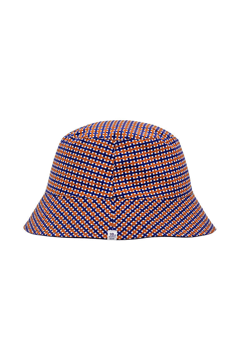 A flat view of the plaid design for a floppy bucket hat
