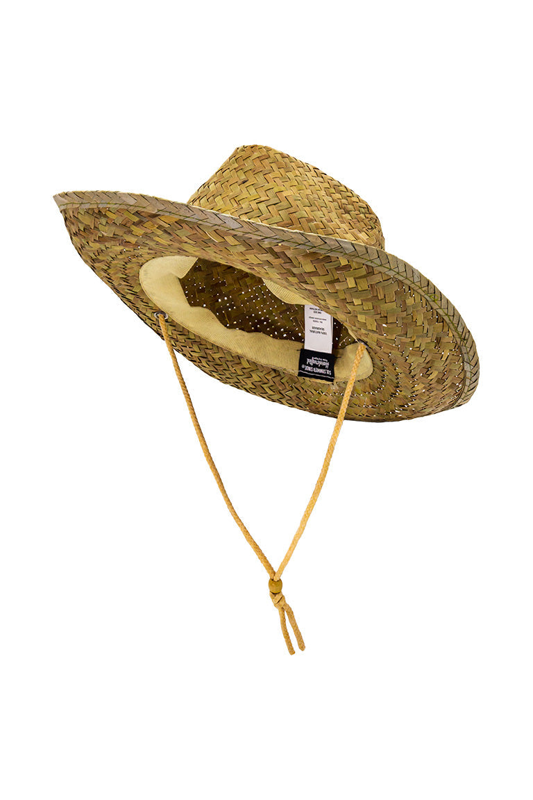 Side view of a straw hat shaped in a cowboy design with and adjustable strap for the chin