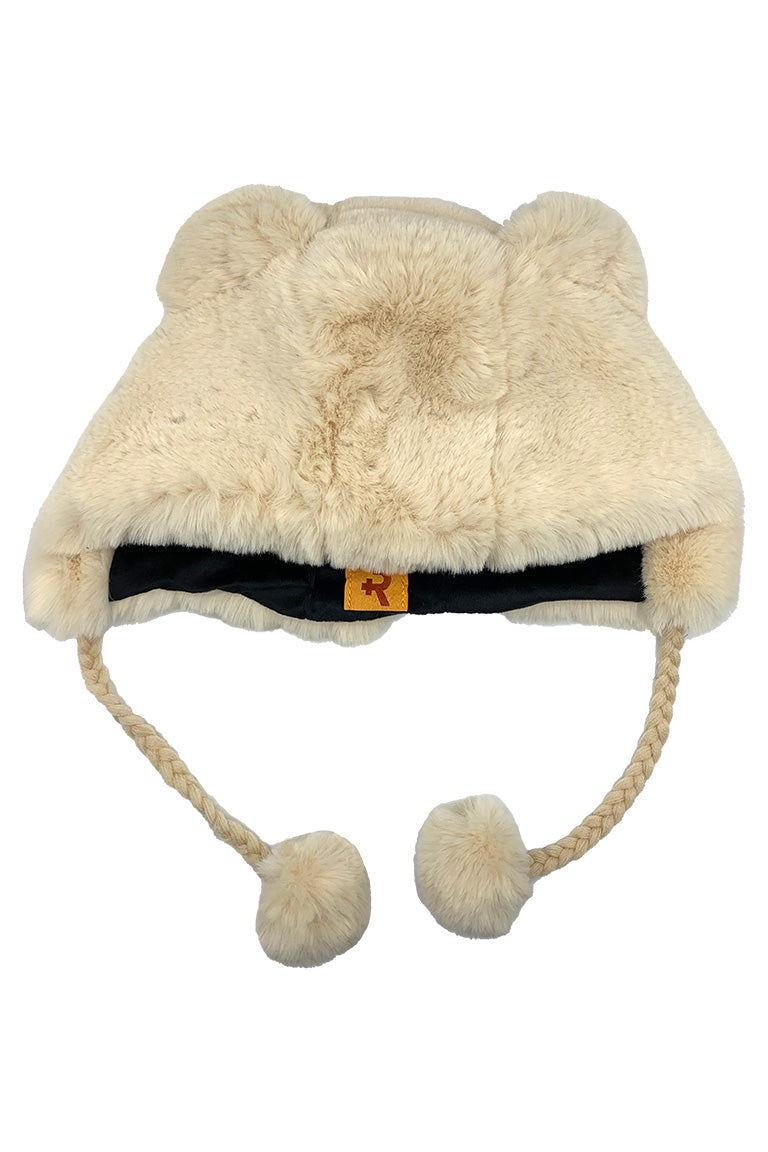 A cream colored fashion hat with the imitated design of a bear