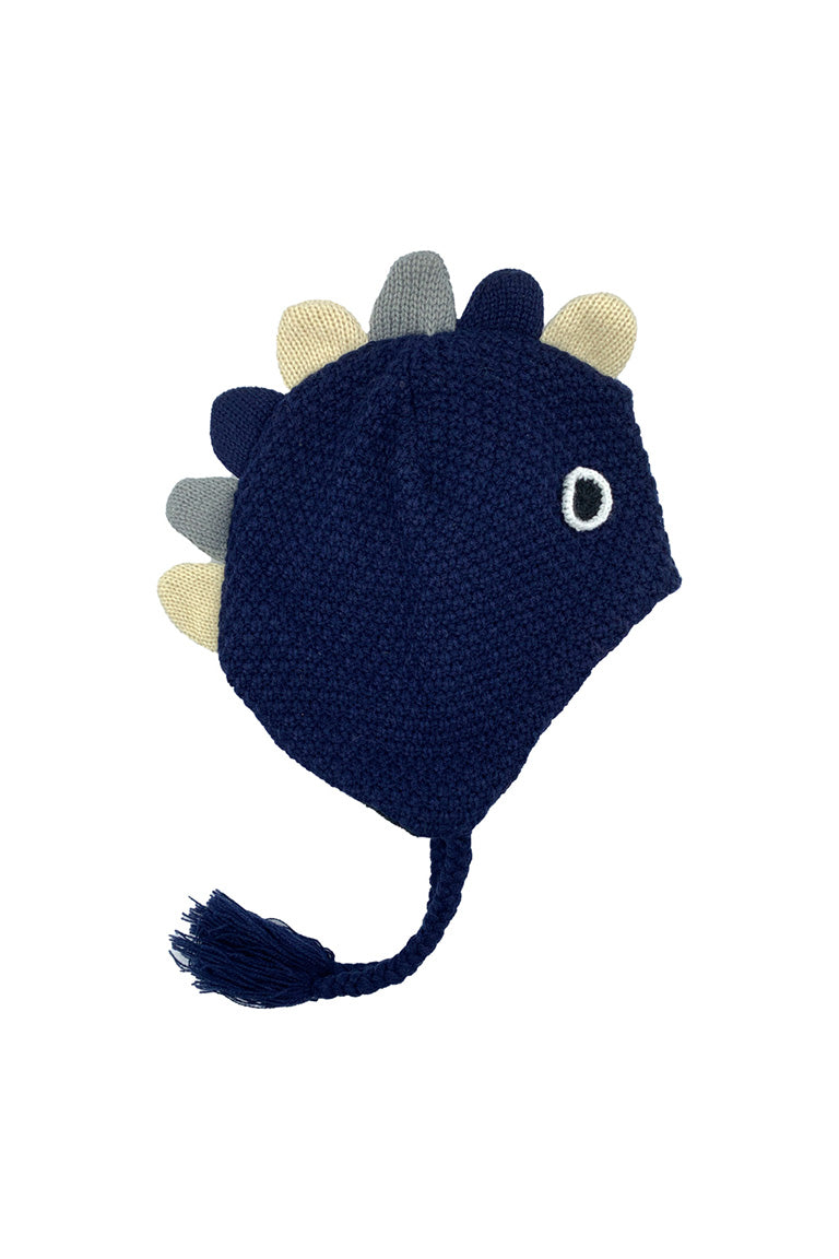 A kids size knitted hat with a design of a navy dinosaur from the side view