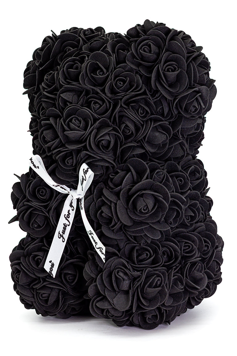 A flower bear decoration covered in black foam shaped roses