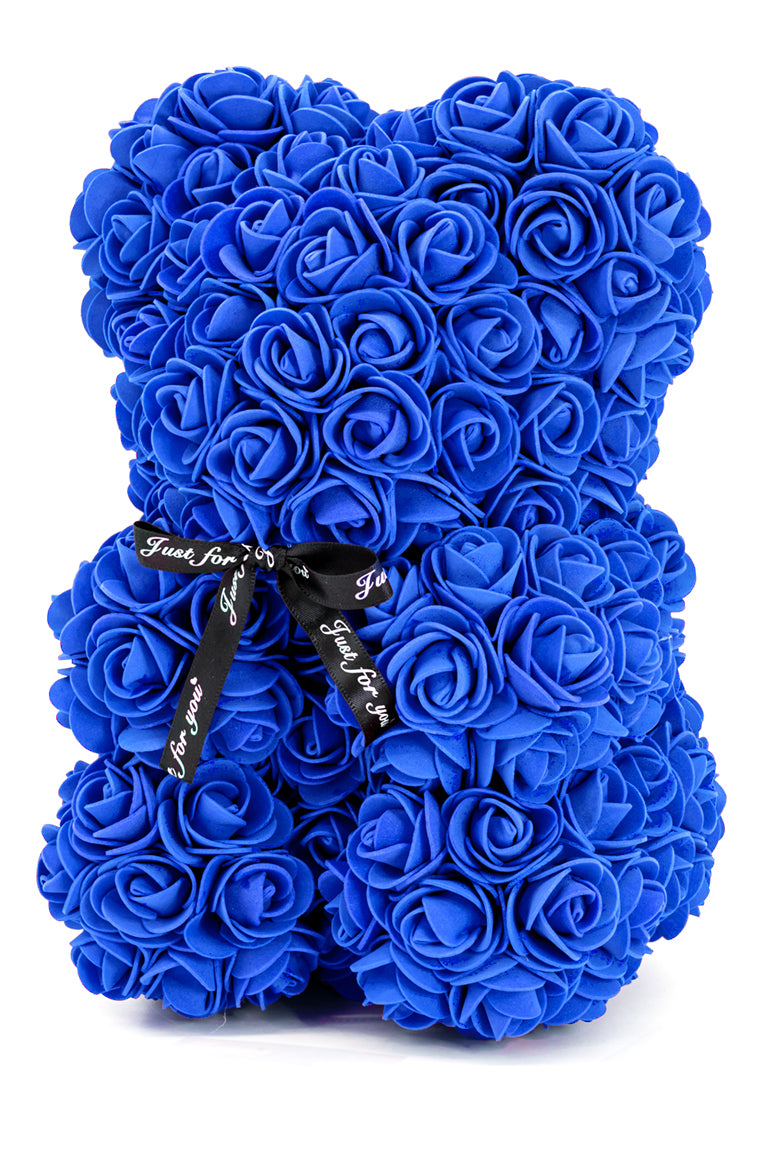A flower bear decoration covered in navy blue foam shaped roses
