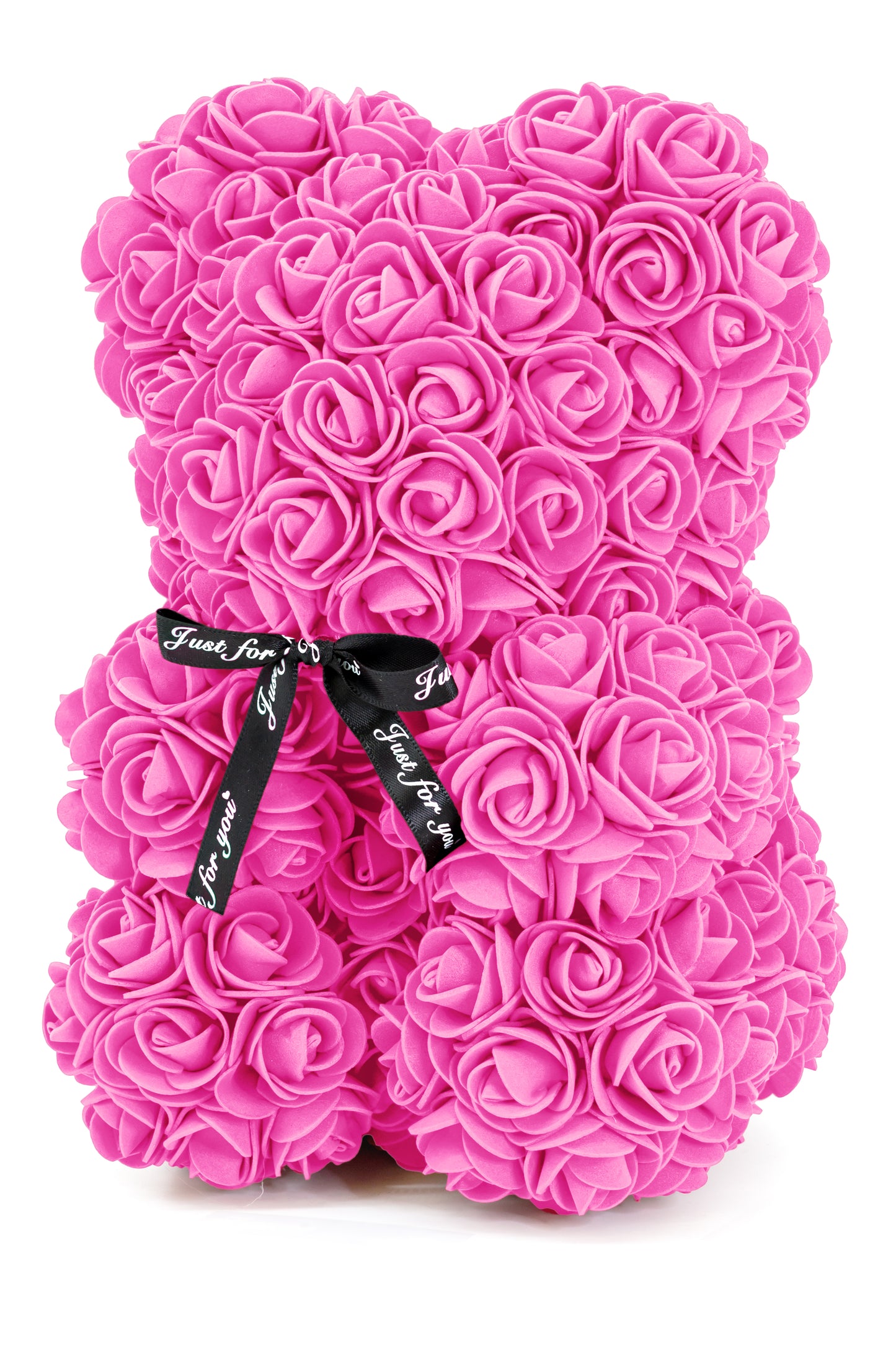 A bear shape decorative piece covered in pink color foam flowers. With a black bow ribbon around underneath the head.