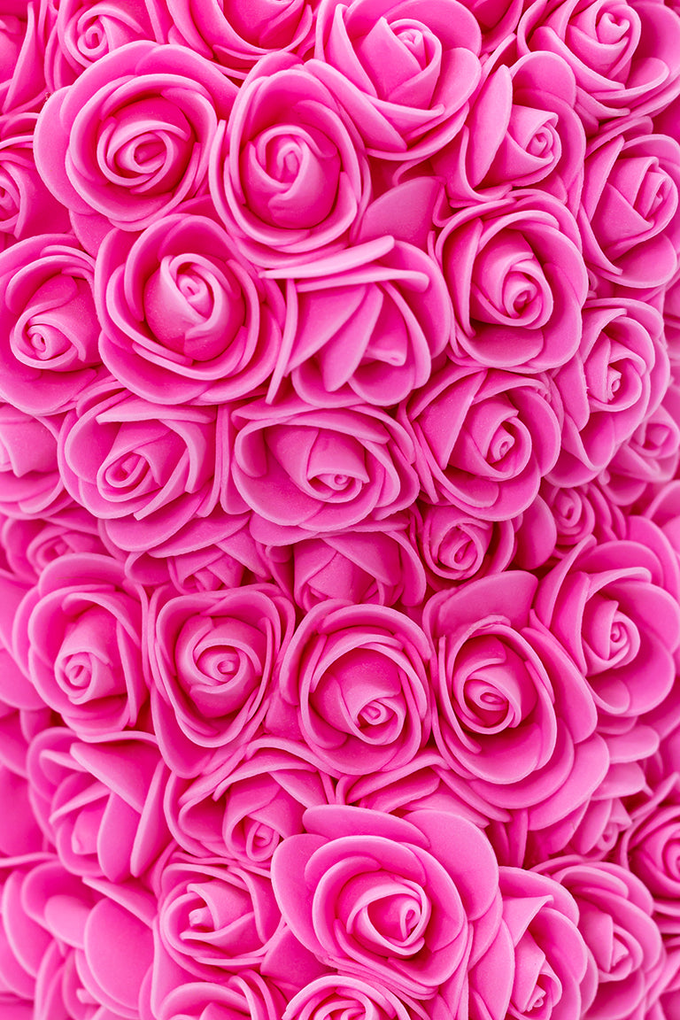 A close up shot of pink foam shaped roses