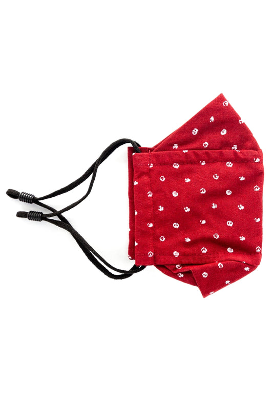 A red colored adjustable face mask with white dot pattern made in Turkey