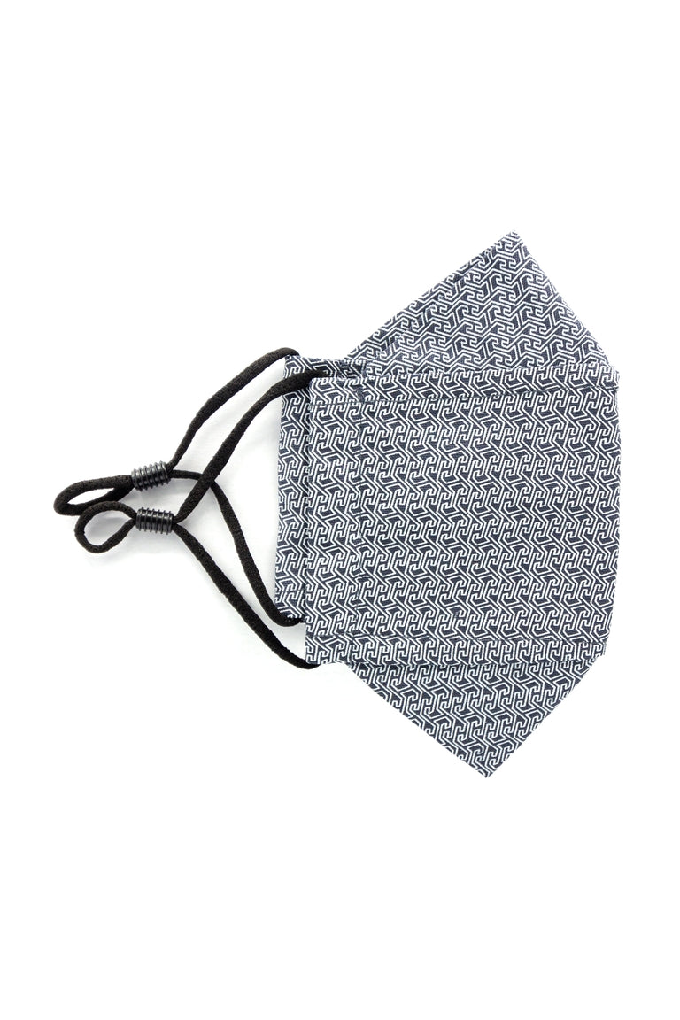A gray colored adjustable face mask with white dot pattern made in Turkey