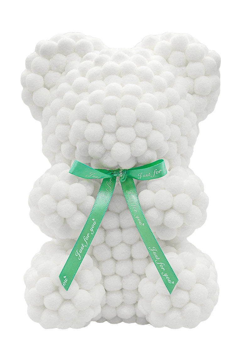 A white bear shape ornament covered in tiny foam balls