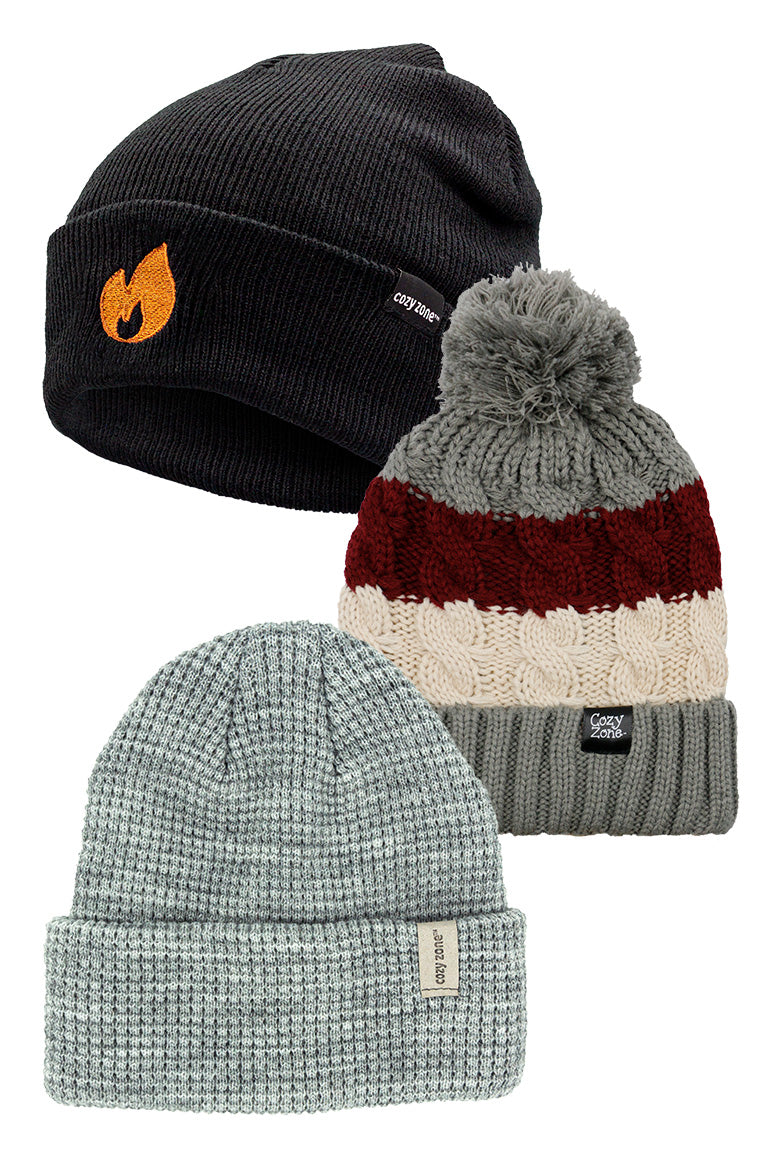 Three hats starting from top to bottom: a black beanie with a flame orange patch, a beanie with a pom-pom on top and a gray beanie