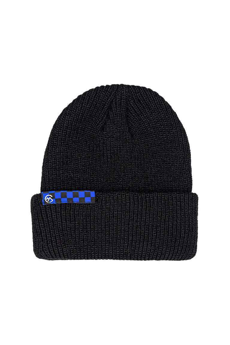 A black beanie with a small tag of a black and navy checkered design