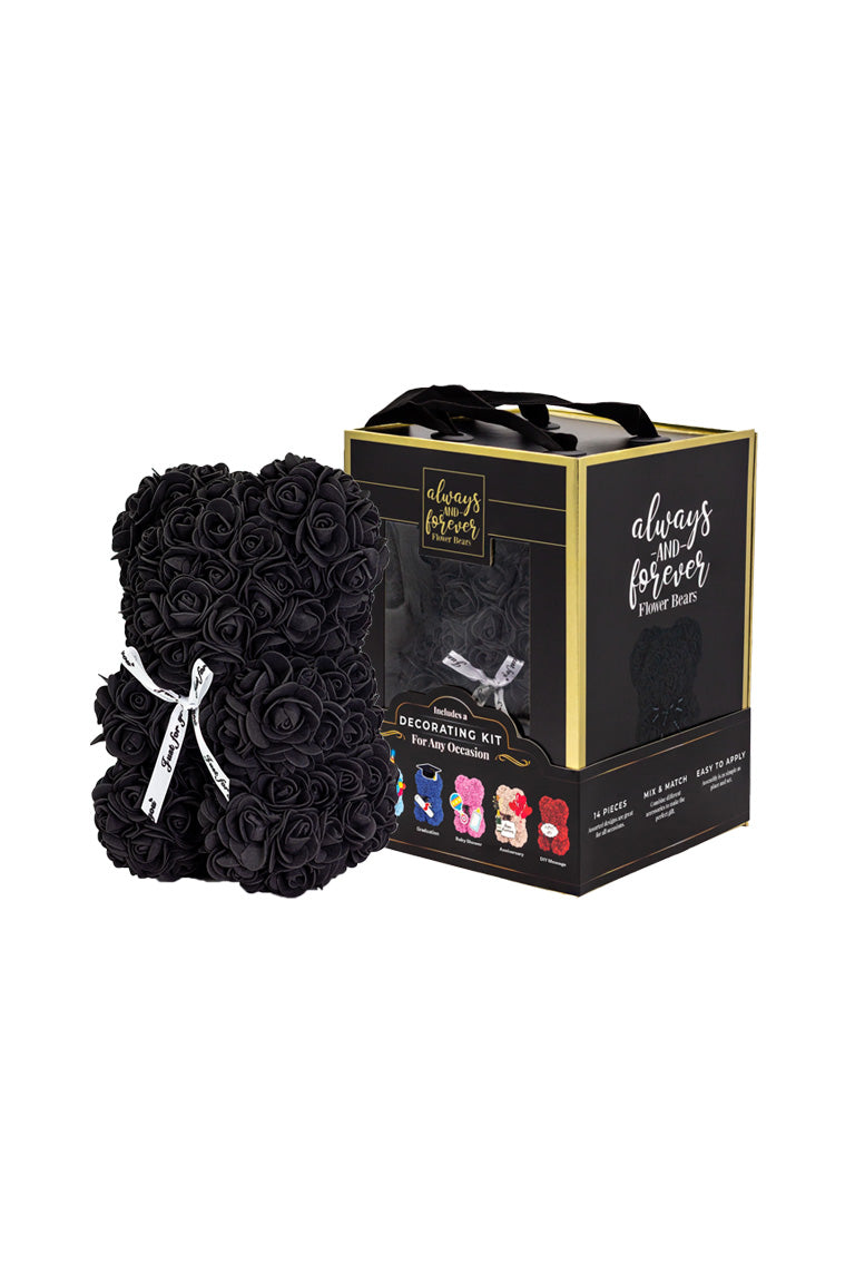 A flower bear decoration covered in black foam shaped roses. With black packaging box next to it