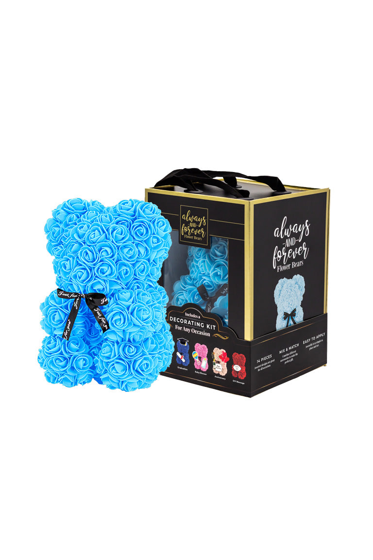 A flower bear decoration covered in blue foam shaped roses. With black packaging box next to it