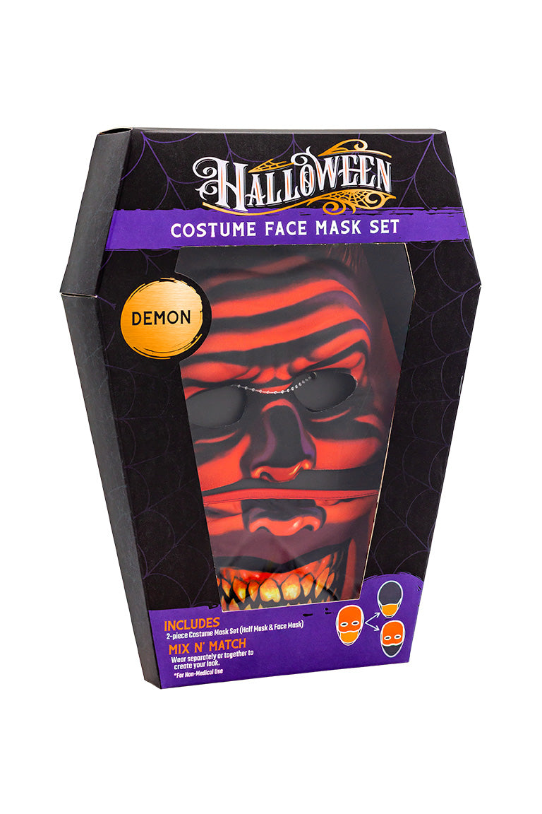 A 2 piece face mask of an demon design. One piece to cover the eyes and nose. The other separate piece to cover the mouth inside a coffin shaped packaging box.