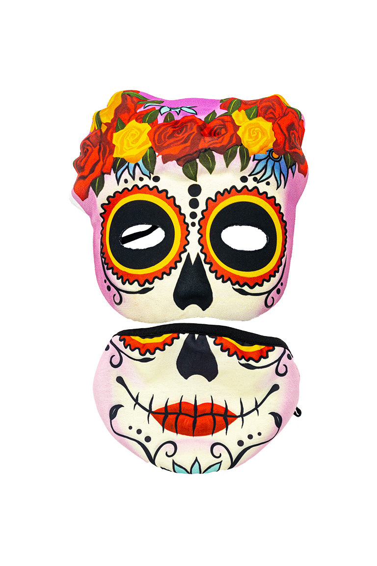 A 2 piece face mask of an sugar skull design. One piece to cover the eyes and nose. The other separate piece to cover the mouth.